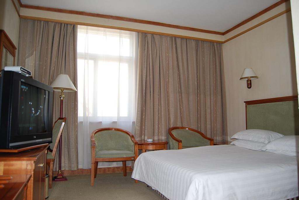Hami Hotel Habitación foto