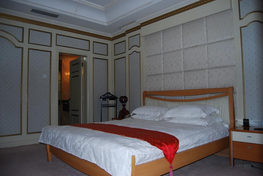 Hami Hotel Habitación foto